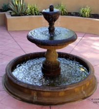#1075 Acqua Terminus Fountain Shown with Pond Coping.jpg